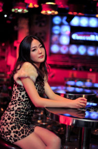 chinese beautiful woman at the bar